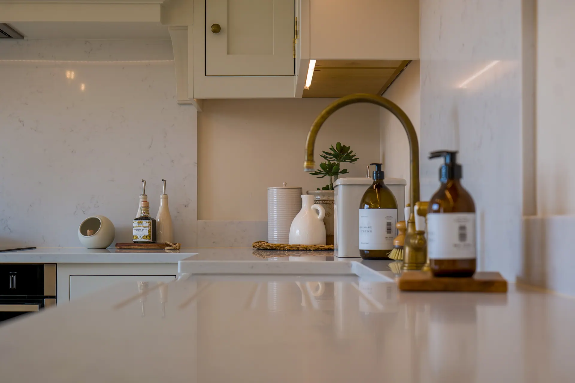 A beamed cottage kitchen by Charles Vivian