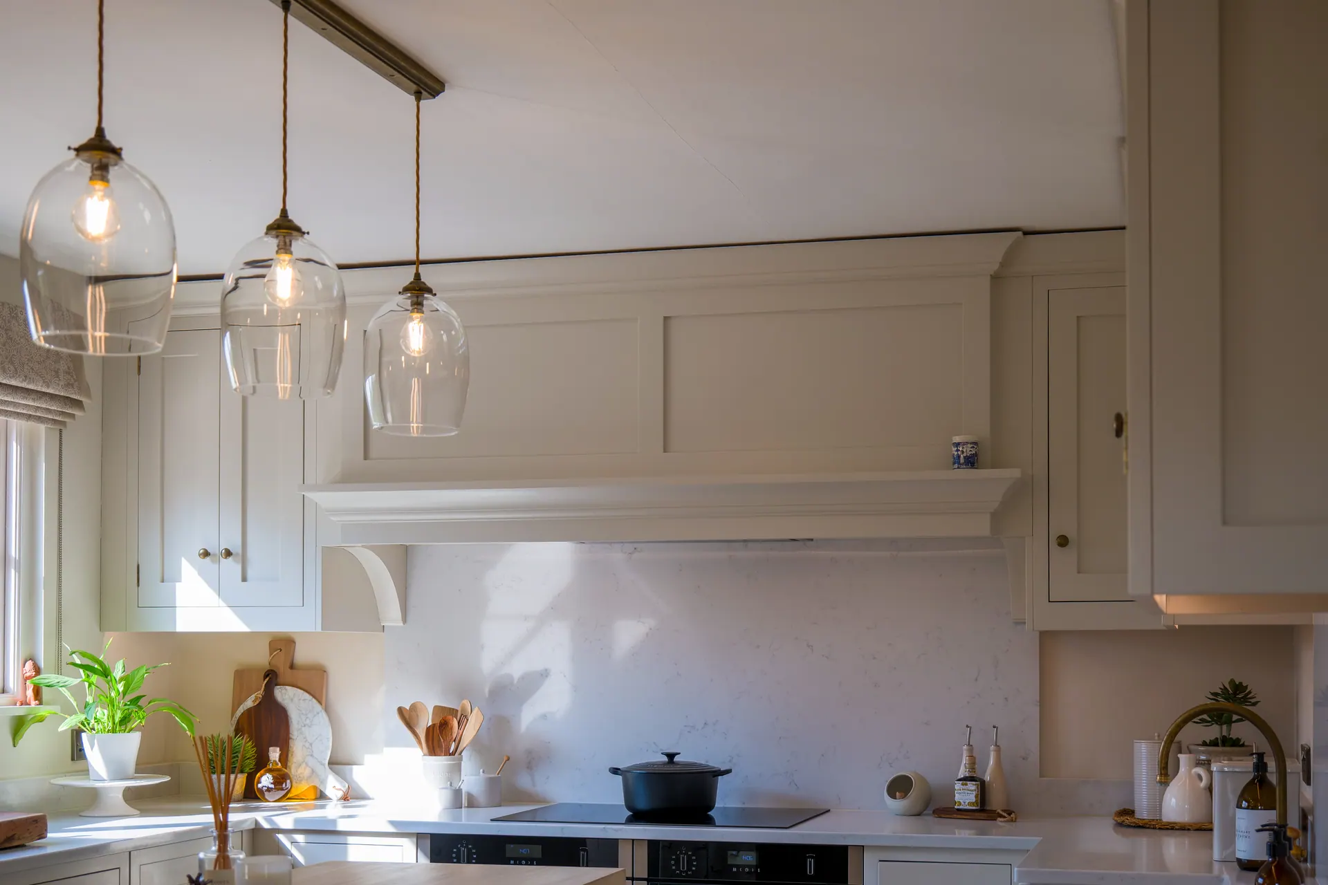 A beamed cottage kitchen by Charles Vivian